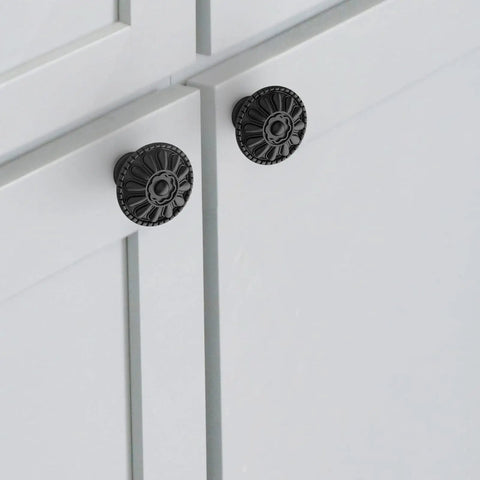 Four Pack Matt Black Kitchen Cabinet Knobs 1.25 Inch Round Zinc Drawer Knobs With Victorian Floral Pattern on cabinet doors