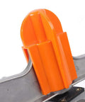Close-up of the orange nozzle of The Ultimate Workhorse 2 Inch Adjustable Irrigation Sprinkler Spray Gun.