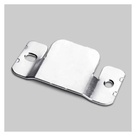 Close-up of a heavy duty metal clip, part of Universal Sectional Sofa Connectors Lock Down Your Couch And Keep It Tight With Heavy Duty Interlocking Furniture Clips That Stop Shifting And Secure Your Living Room Setup.