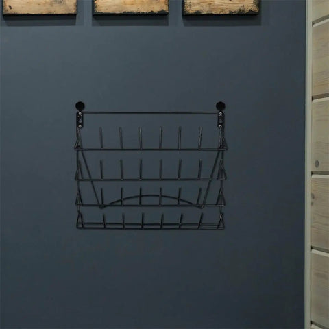 Hella Durable Wall Mount Display Rack Two Pack Iron Hanging Storage Organizer For Mugs Glasses And Home Decor Space Saving Black Rack mounted on gray wall.