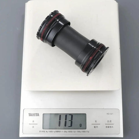 Token T47 Threaded Bottom Bracket Black For Shimano 24mm Steel Bearing on scale, weight 113g, ultra durable alloy build