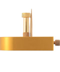 Pro-Grade Watch Repair Tool Kit component with balance wheel stand and hairspring holder in gold finish.
