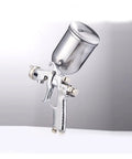 Pro Grade Manual Paint Spray Gun Featuring Slick Adjustable Flow And Fan Patterns For Dead Flat Coats Ergonomic Grip and Precision Tip.