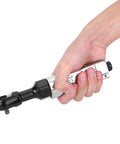 Wicked Smooth Aluminum Pneumatic Ratchet Wrench With A Quarter Inch Square Drive and 25 Ft Lbs Adjustable Torque Lever being held in hand.