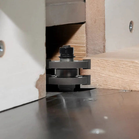 Close view of Adjustable Tongue And Groove Router Bit Set With One Half Inch Shank for wood milling on oak.