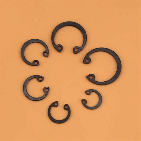 Assorted sizes of 11mm-21mm C-type retaining rings from 100 Piece C Clip Snap Ring Kit With Box 11mm To 21mm C Type Retaining Rings