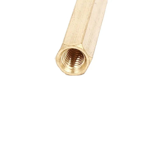 Close-up view of a Badass Brass Hex Standoff Spacer for PCBs M4 X 25mm threads, showcasing internal threading.