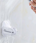 360 Degree Adjustable Shower Head Holder Wall Mount With Tool Free Ultra Strong Adhesive on bathroom wall, hand holding shower head