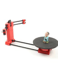 Next Level Precision Open Source Diy 3D Scanner Kit featuring red injection molded parts, showcasing a scanning setup with a figure.