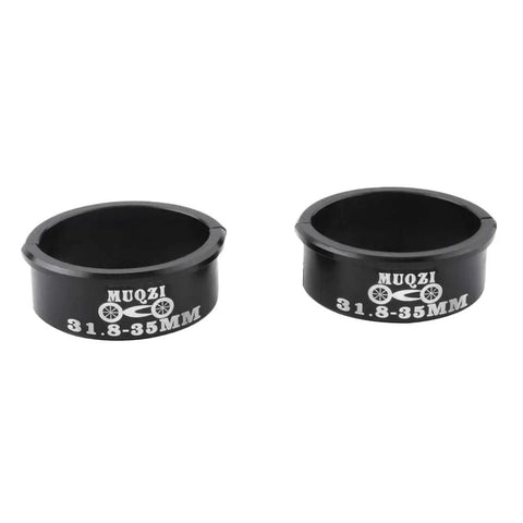 Pair of black aluminum alloy shims 31.8 to 35mm labeled for MTB and road bikes, Aluminum Alloy Handlebar Shim 31 8mm To 35mm Fit For MTB Road Mountain And Fixed Gear Bikes Easy Install Durable Black Upgrade For Smoother Steering And Less Wobble On Everyday Trails