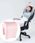 Light pink Neck Support Memory Foam Pillow For Office Chair And Desk All Day Comfort, shown next to a relaxed person on chair.