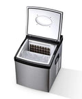 Sleek Portable Countertop Ice Maker Machine Runs Super Quiet Generating Crisp Square Ice Cubes Fast includes a clear storage bin.