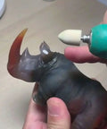 Pro Grade Wool Felt Polishing Bits Set for Rotary Tools, using cone shape buffing point on rhino sculpture for polishing