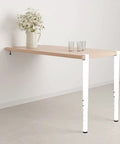 Heavy Duty Adjustable Table Legs With Black F Shaped Clamp Base Quick Slide Setup No Drilling Hassle Durable Floor Guards Included For Solid Diy Desks And Rustic Dining Projects Set Of Four with white metal legs and wooden top.