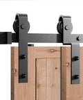 Heavy Duty Sliding Barn Door Hardware Kit For Double Door Bypass And Single Track Low Ceiling Mount 5Ft Rail Tough As Nails Carbon Steel With Black Frost Finish Supports Up To 200 Lb Easy Install. Front view of mounted hardware on wood doors.