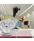 Silver Adjustable LED Recessed Spotlight in modern living room with adjustable head and stylish design.