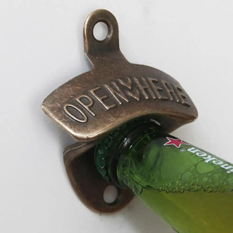 Badass 2 Pack Wall Mounted Beer Bottle Opener, Rustic Heavy Duty Metal for Bars and Game Rooms, bottle resting below opener.