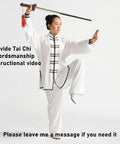 Person practicing with Scalable Tai Chi Training Sword Kit with Storage Pouch and Instructional Videos, 35.4 inch blade.
