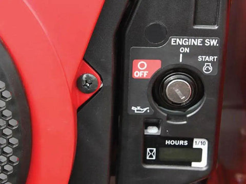 Close-up of engine control panel showing start switch and hour meter for Heavy Hitter Stump Grinder With 20 HP Honda Engine And Electric Start Featuring Quick Side Discharge Frame Five Adjustable Handles And Rock Solid Triple Cutting Teeth For Brutal Yard Clearing Tasks.