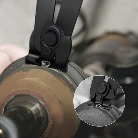 Close-up of Go-To CV Joint Axle Boot Clamp Pliers Tool with 24 Crimp Bands Ear Type Extension on automotive part.