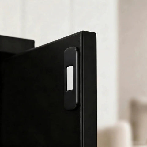 Close-up of a black door with Eight Piece Ultra Thin Magnetic Cabinet Door Catch No Drill Stainless Steel With Strong Hold Quiet Operation.
