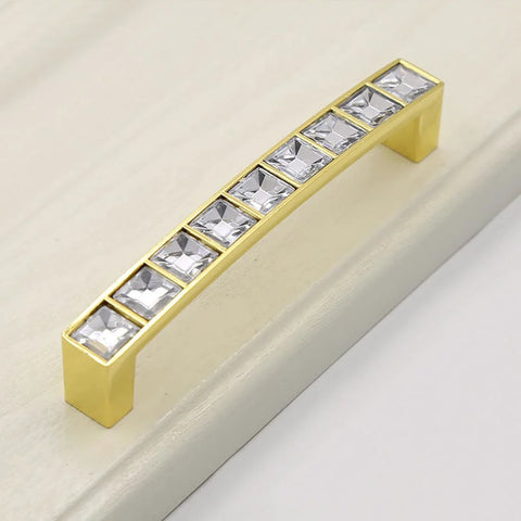 Gold U Shape Crystal Glass Cabinet Knobs Set on white surface
