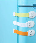Stick On Cabinet Locks 10 Pack Self Adhesive PP Material Kid Proof Latches in assorted colors on blue surface