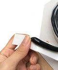 Close-up of Heavy Duty Butyl Sealant Tape for Cars Trucks RVs Boats and Home Projects being unrolled, showing flexibility and texture.