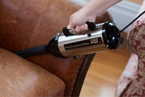 Using the Evolution Hand Vacuum Portable 120V 504W With All Steel Construction For Dry Pickup At Home Office Or Car Satin Nickel Black