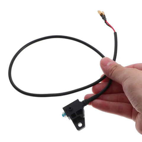 4 Piece Motorcycle Brake Switch Set waterproof durable plastic easy install for electric bikes and motorbikes shown in hand