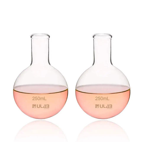 Round Bottom Boiling Flask Set, Two Pack 250ml Each, Borosilicate 3.3 Glass, Short Neck Non Graduated, Heat Resistant Lab Glassware For Prolonged Boiling And Uniform Heating, displaying clear glass design and pink liquid content.