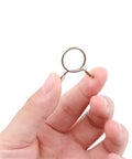 Hand holding single clip from Heavy Duty Fuel Line Hose Clamp Kit 250 Pieces With 10 Sizes From 5mm To 14mm Iron Zinc Plated Clips