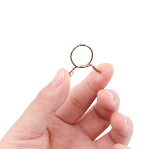 Hand holding single clip from Heavy Duty Fuel Line Hose Clamp Kit 250 Pieces With 10 Sizes From 5mm To 14mm Iron Zinc Plated Clips