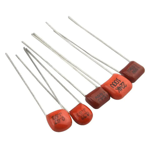 Red metallized polypropylene film capacitors from assortment kit, 100 pieces, 10 values from 10nF to 474nF, 100V rating, CBB style