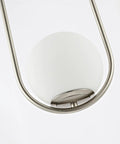 Close-up of Matte Black 5 Light Pendant Chandelier, Modern Linear Ceiling Light Fixture with cylinder frosted glass shade detail