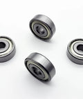 Get A Buttery Smooth Ride With These Heavy Duty Wheelchair Rear Bearings 4 Pack Universal 11mm Fits Seven 16 Inch Axle. Close-up of bearings.