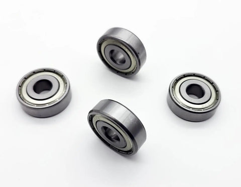 Get A Buttery Smooth Ride With These Heavy Duty Wheelchair Rear Bearings 4 Pack Universal 11mm Fits Seven 16 Inch Axle. Close-up of bearings.