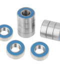 25 Pack Small Sealed Ball Bearings MR115 2RS 5x11x4mm Steel With Rubber Seals arranged in a stack and row