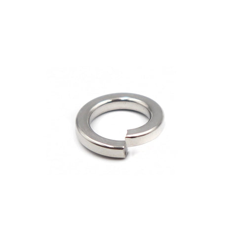 Close-up of stainless steel split lock washer for metric fasteners; circular ring with a single gap.
