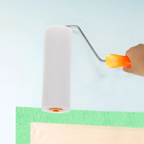 10 Pack White Sponge Paint Roller Covers Replacement Sleeves For House Painting Create Beautiful Texture Finishes With Soft Low Density Sponge Makes Walls Look Awesome Perfect For Large Areas And DIY Craft Nailing The Finish Every Single Time, held above a wall.