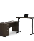 Kick Up Your Office Setup With This Hella Sturdy L Shaped Standing Desk Bundle In Dark Chocolate showcasing adjustable height and three drawers.