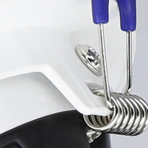 Close-up of WKNHHL 9 Pack Led Downlights connector detail, showing white aluminum body and steel spring clip.
