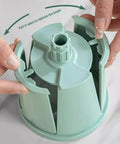 Le d Affaires 5-in-1 cheese grater and vegetable slicer, green plastic hand-crank chopper.