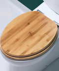 Top Shelf Thickened Toilet Seat With Quiet Drop Lid And Contoured Wooden Cushion For Chic Home Bathrooms No Sweat Setup Plus Heavy Duty Soft Close guarantees a comfortable wooden seat.