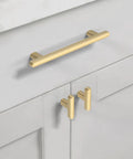 10 Pack 5 Inch Brushed Gold Cabinet Handles for Kitchen Cabinets and Drawers installed on white cabinet doors