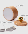 Wireless Wall Mounted Reading Light Two-Pack With USB Charging Port, Rechargeable Battery, wooden base, USB-C cable shown