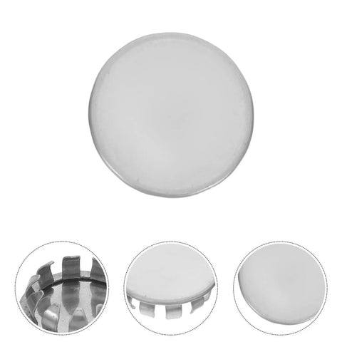 Close-up of a round stainless steel knockout plug from the 10 Pack Round Stainless Steel Knockout Plugs For Junction Boxes And Electrical Panels.