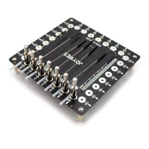 Top view of a black circuit board featuring switches for Multi-Function Probe Data Repair Tool For Flying Leads And PCB Jumpers.