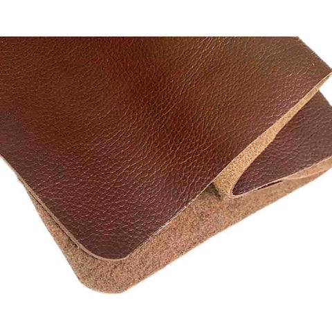 Close-up of Rock Solid Wide Flat Leather Straps, Knockout Full Grain Cowhide Hide Sheet In Warm Brown Red, 39 By 39 Inches.