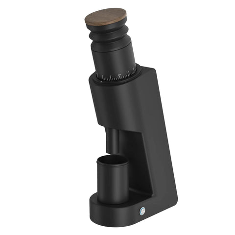 Rock Solid Single Dose Coffee Grinder With Brawny 38 Mm Conical Burrs And Butter Smooth Stepless Dial For Bold Espresso Pour Over Pulls Low Retention Anti Static Frame In Matte Black, angled view.